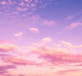 Pink and purple evening sky with clouds Pink and purple clouds in evening sky