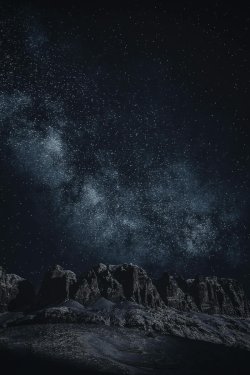 Star-filled night sky over mountains Starry sky with Milky Way over mountains