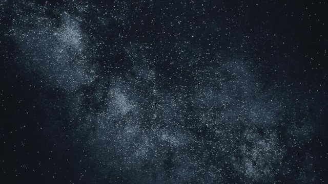 Star-filled night sky over mountains Starry sky with Milky Way over mountains